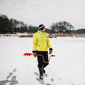 Man going ice fishing